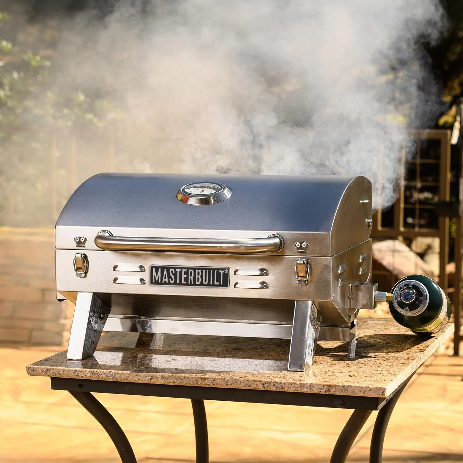Masterbuilt Portable Propane Gas Grill with Folding Legs, Chrome-Coated Warming Rack and 288 Cooking Square Inches in Stainless Steel, Model MB20030819